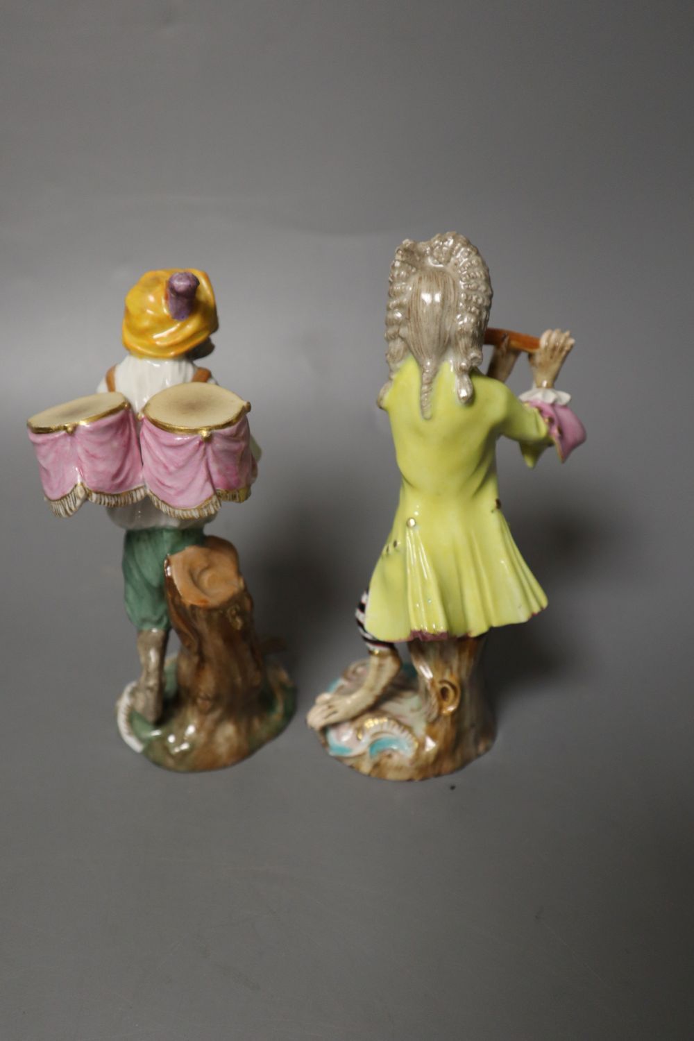 Six 19th century Meissen monkey band figures and another Volkstedt example, tallest 15cm